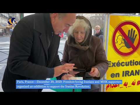 Paris—December 20, 2023: MEK supporters organized an exhibition to support the Iranian Revolution.