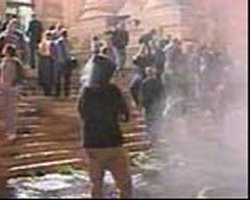 SSF agents fire tear gas into the crowd of students