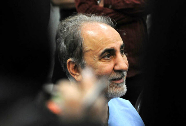 Iranian Ex-Official Drinks Tea With Cops After Turning Himself in for 'Shooting Wife'
