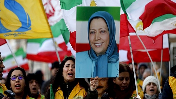 Young-female-supporters-of-the-Iranian-Resistance-hold-pictures-of-NCRI’s-President-elect-Maryam-Rajavi-in-a-demonstration-in-London. Young-female-supporters-of-the-Iranian-Resistance-hold-pictures-of-NCRI’s-President-elect-Maryam-Rajavi-in-a-demonstration-in-London.