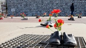 Families and survivors of the 1988 massacre hold an exhibition in front of the United Nations headquarters in Geneva