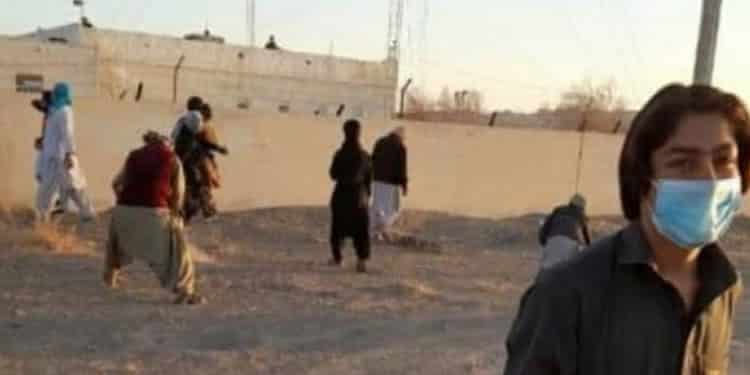 Iran-protests-over-killing-of-Baluch-fuel-traders 16-year-old protester Hassan Mohammad Zehi (right) before being shot and killed by IRGC forces during the protests in Sistan and Baluchestan Province.