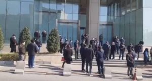 Iran Mall's contractors hold a rally in front of the central building of Ayandeh Bank in Tehran