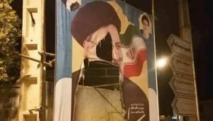 Iranian-people-are-ripping-posters-of-Ebrahim-Raisi-the-leading-candidate-for-the-regimes-sham-presidential-election