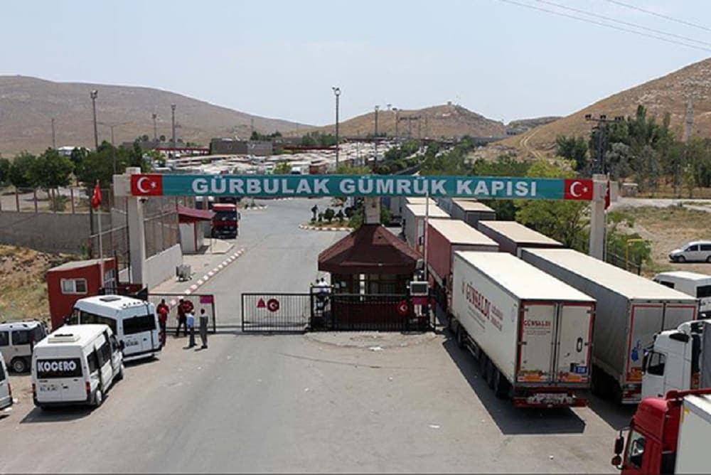 iran-turkey-border-trucks-min