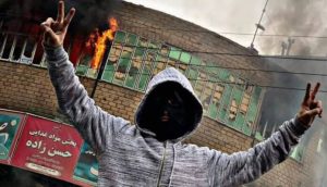 iran-uprising-victory-sign-young-man iran-uprising-victory-sign-young-man