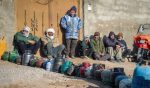 iran old men waiting gas shortage