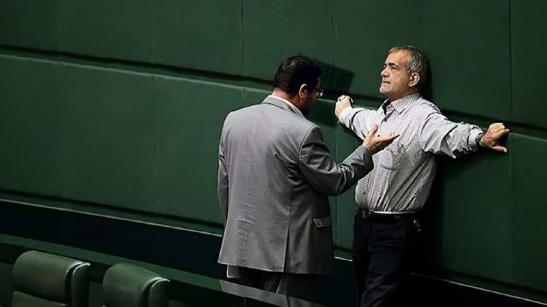 The Iranian regime's president Masoud Pezeshkian appears exhausted, leaning against a wall during a tense parliamentary session in Tehran, July 2024