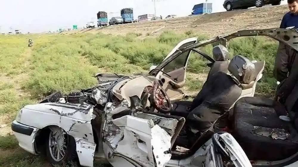 Wreckage of a fatal car crash on an Iranian highway, highlighting the country's alarming road safety crisis