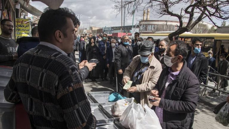 Iranians stand in long queue to buy poultry