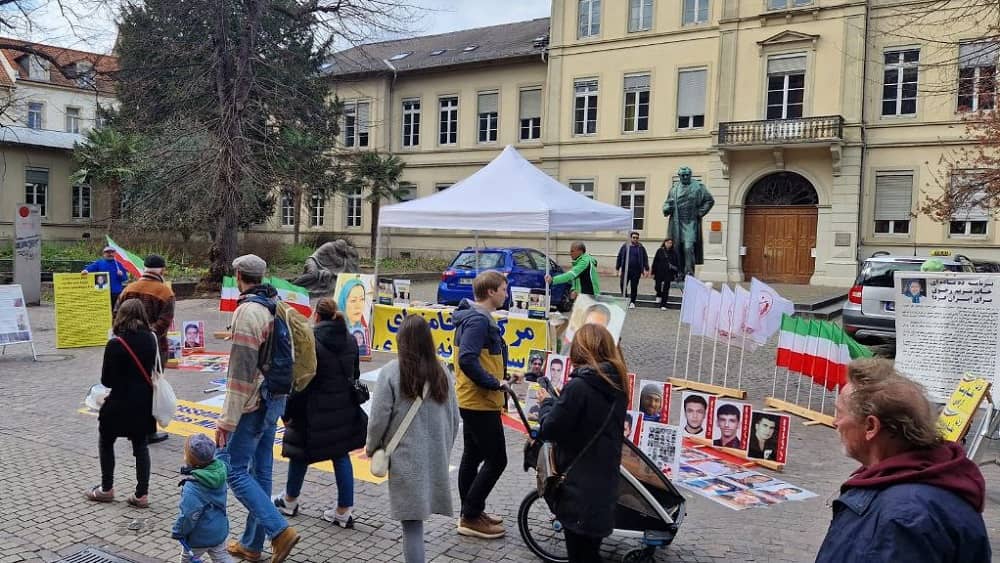 Supporters of the Iranian Resistance in Heidelberg, Germany, held a bookstand on March 22, 2025
