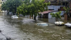 Cars submerged in floodwaters following severe damage from the March 2025 floods in Sar Firouzabad, Kermanshah
