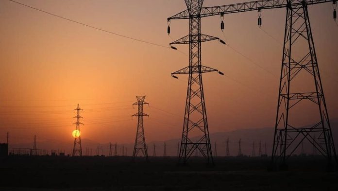 AI-generated image depicting a darkened high-voltage power grid amid widespread electricity shortages in Iran