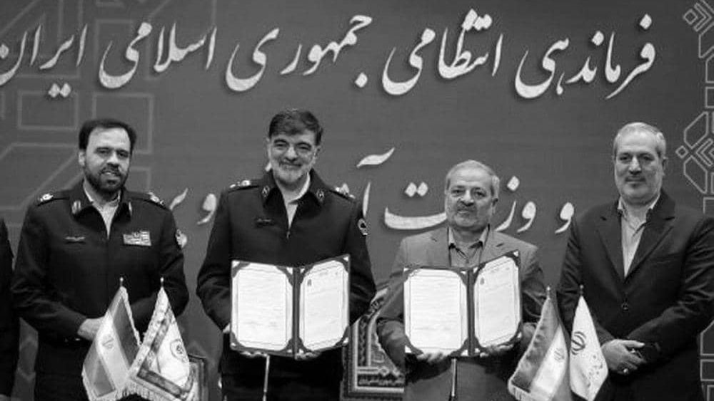 Iranian regime's Minister of Education Alireza Kazemi and SSF commander Ahmadreza Radan sign a joint agreement to align schools with state security policies — Tehran, April 20, 2025