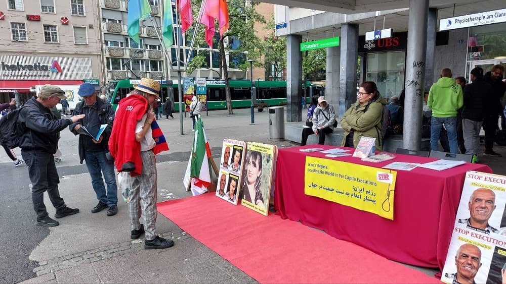 Supporters of the Iranian Resistance in Basel, Switzerland, held a bookstand on May 7, 2025