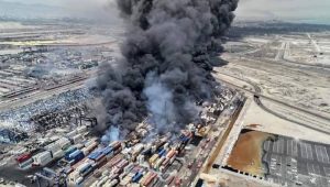 Aerial view of Rajaee Port, Bandar Abbas – April 26, 2025 — Smoke billows into the sky following a massive explosion at the port