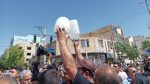 Residents of Shahr-e Kord, western Iran, rally with handwritten signs and chants demanding drinking water solutions and accountability from local officials, August 16, 2022