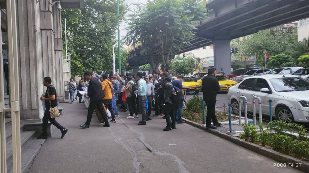 Official oil workers in Tehran stage a protest outside the regime's Ministry of Oil on Sunday, May 4, 2025