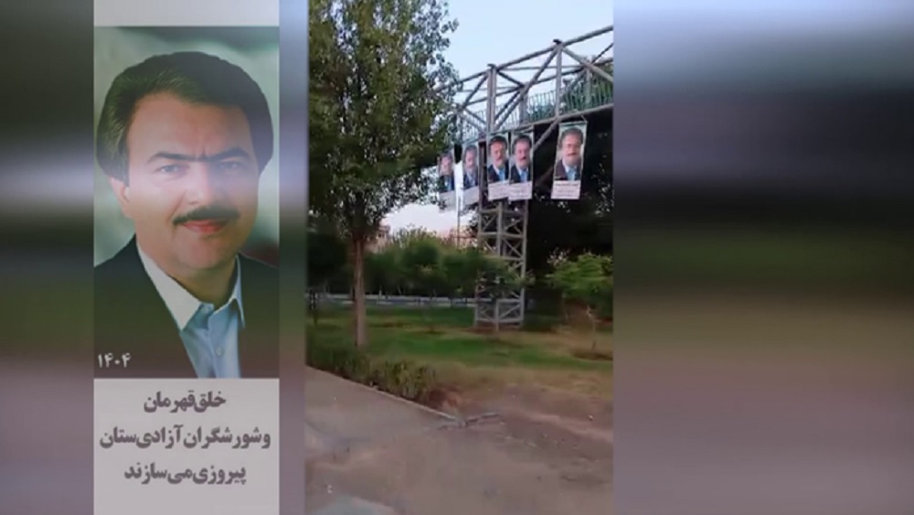 Tehran – Image of resistance leader Massoud Rajavi installed on pedestrian bridge