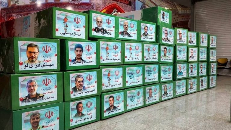 Dozens of coffins draped in the regime's flag bear the faces of slain IRGC commanders and nuclear scientists