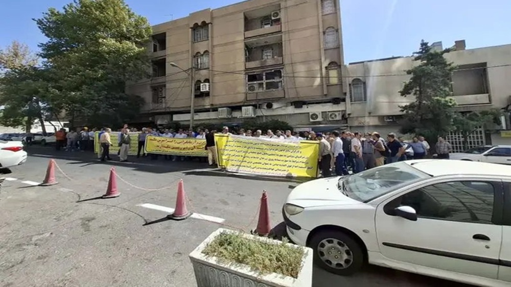 August 26—Tehran, IranProtest by "yellow hat" electricity workers in Iran