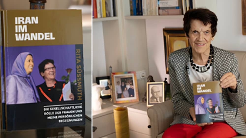 Professor Rita Süssmuth, former President of the German Bundestag, holding her new book "Iran on the Brink of Transformation"