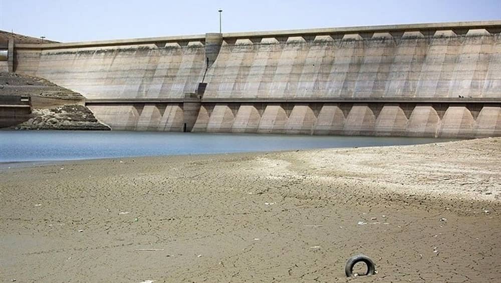 Receding reservoir exposes a cracked lakebed at a dam in northern Golestan Province, underscoring Iran’s deepening water crisis