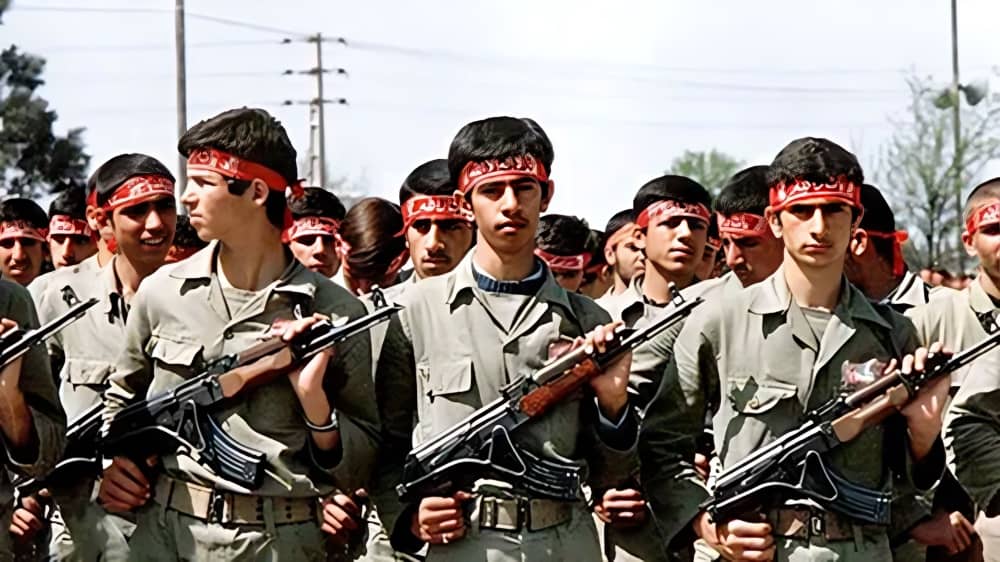 Iranian child soldiers are lined up before being dispatched to the frontlines during the eight year war with Iraq