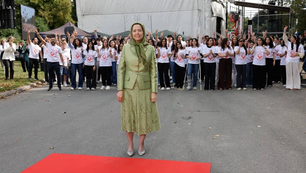NCRI President-elect Maryam Rajavi stands with Iranian youth during the 2025 Free Iran Rally in Brussels— September 6, 2025