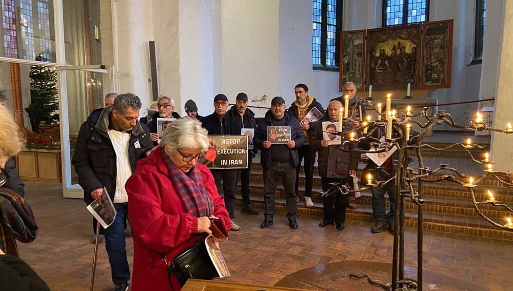 NCRI supporters mark the 100th week of “No to Execution Tuesdays,” gathering at a church in solidarity and to mark Christmas — December 23, 2025