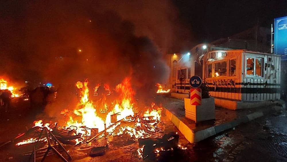 Fires burn at Kaj Square in Saadat Abad, Tehran, on the night of January 8, 2026, as unrest and street confrontations intensify during protests