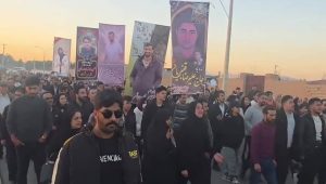 People in Najafabad, Isfahan Province, march to a cemetery to commemorate the 40th day for those killed during the January uprising — Feb. 17, 2026