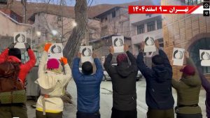 Members of PMOI-led Resistance Units in Tehran hold the emblem of the National Liberation Army of Iran (NLA) on Saturday, February 28, 2026