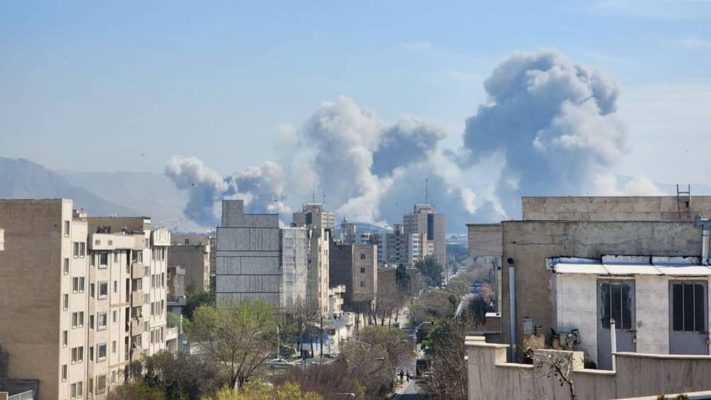 Smoke rises over eastern Tehran after reported strikes, March 2026