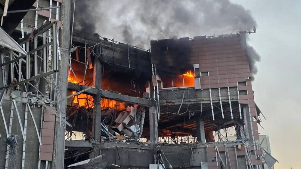 Tehran—images show a strike on an electronics industry building affiliated with the regime’s Defense Ministry on Sayyad Shirazi Highway, Monday, March 23, 2026