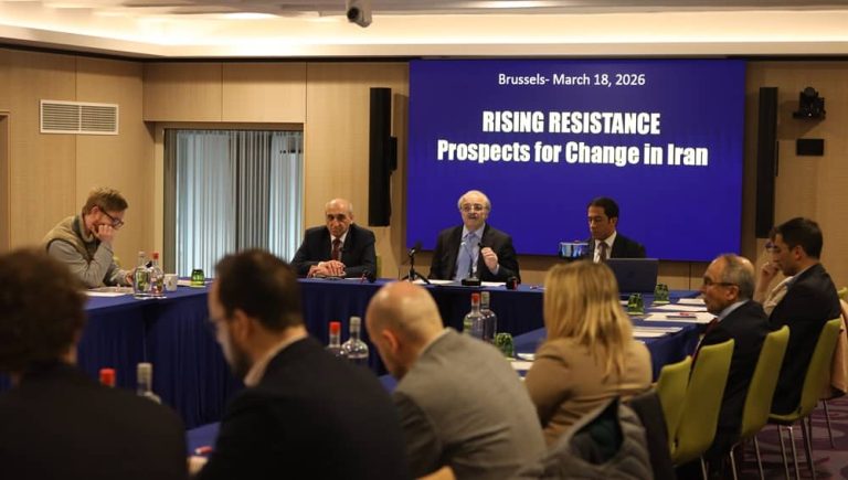 NCRI FAC Chair Mohammad Mohaddessin talks to reporters at a Brussels press conference on March 18, 2026