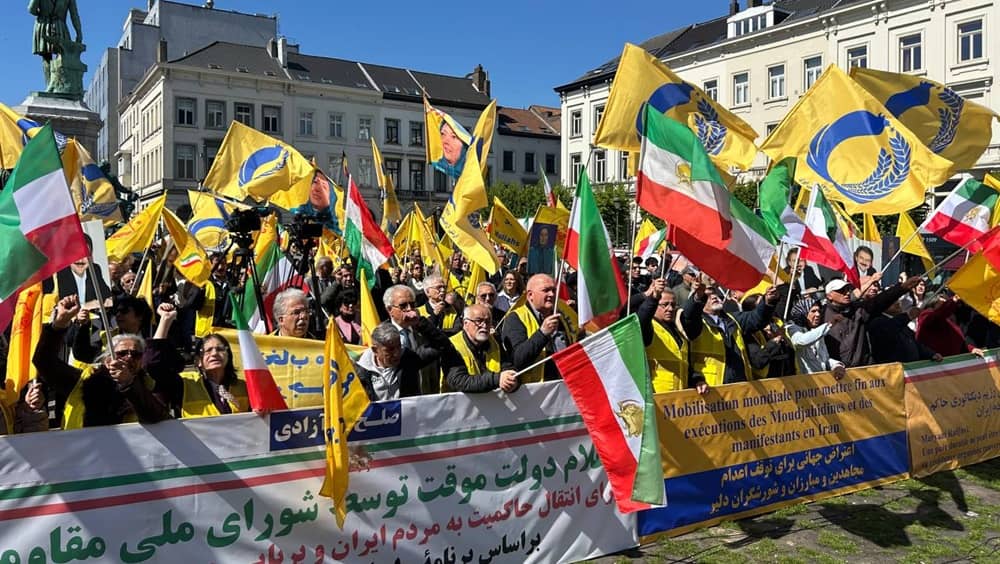 Supporters of the Iranian Resistance rally outside the European Parliament in Brussels, Belgium, on April 22, 2026