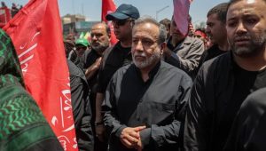 Iranian regime's Foreign Minister Abbas Araghchi during the funeral procession for Ali Khamenei on July 7, 2026, where a group of regime loyalists reportedly attacked him by throwing stones and chanting insults