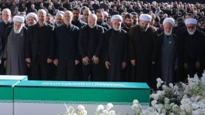 High-ranking Iranian officials stand in a line during the state-staged funeral ceremony for Ali Khamenei— July 5, 2026