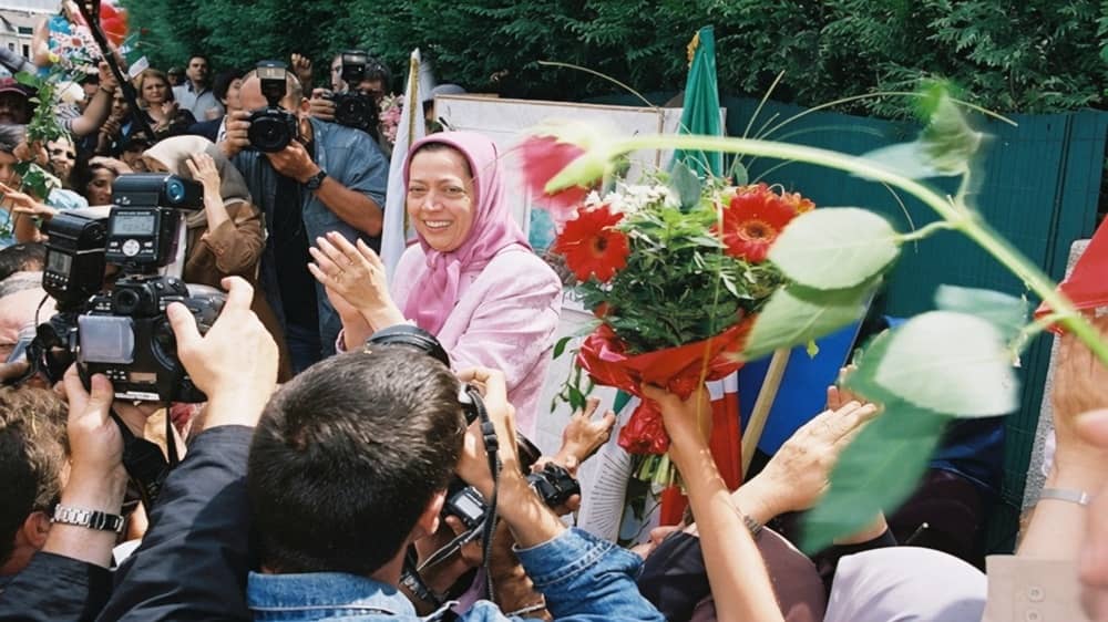 NCRI President-elect Maryam Rajavi smiles as she receives flowers from supporters after her release from French prison on July 3, 2003