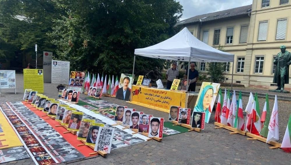 On August 22, 2026, NCRI supporters in Heidelberg, Germany, held a rally and photo exhibition to commemorate the anniversary of the 1988 massacre of political prisoners in Iran
