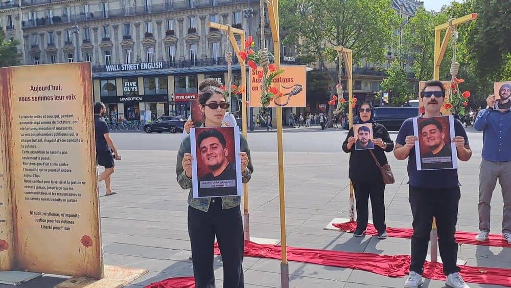 NCRI supporters held a photo exhibition at Place de la République in Paris, France, calling for the abolition of the death penalty in Iran on Saturday, August 1, 2026