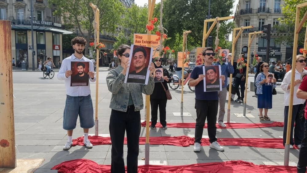 NCRI supporters held a photo exhibition at Place de la République in Paris, France, calling for the abolition of the death penalty in Iran on Saturday, August 1, 2026