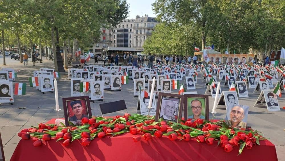 NCRI supporters in Paris, France, staged a photo exhibition for the martyrs who laid their lives down for Iran's freedom during the recent uprisings — July 25, 2026
