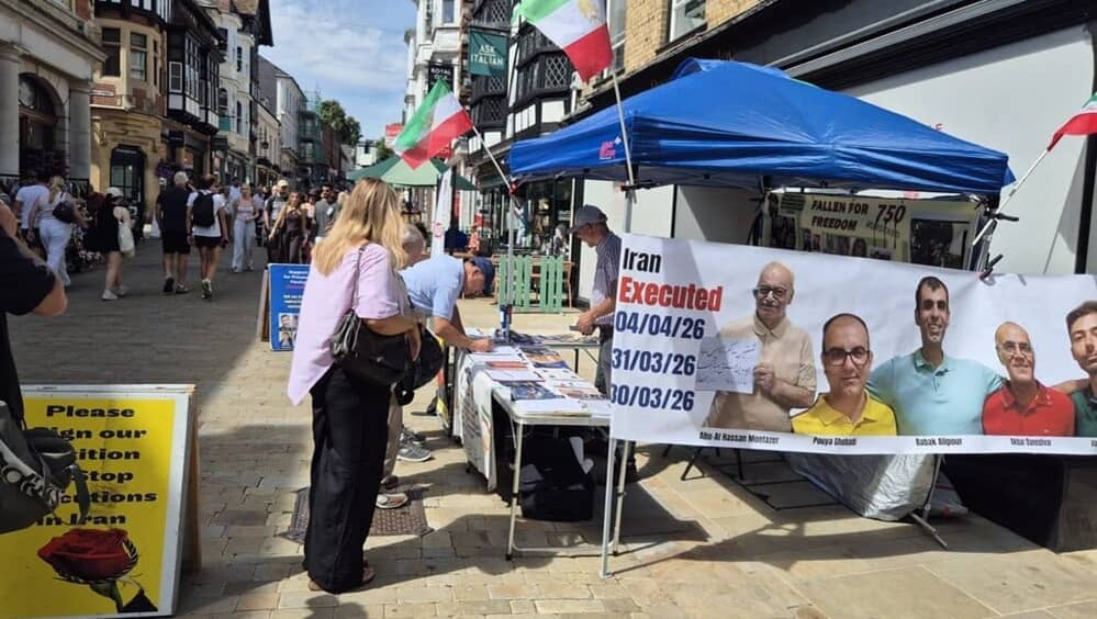 Members of the Academics in Exile Association in the UK, supporters of the NCRI, held a book stand and photo exhibition in Winchester, UK, to raise awareness of the Iranian regime’s escalating executions— August 8, 2026