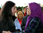 Maryam Rajavi greeting a young Iranian girl Maryam Rajavi greeting a young Iranian girl
