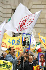 London-demo4-24May LONDON, United Kingdom: Protestors from the National Council of Resistance of Iran demonstrate outside the Foreign Office in London, 24 May 2006, as the permanent members of the UN Security Council meet in London Wednesday over the Iranian regime's nuclear crisis. AFP PHOTO/BEN STANSALL