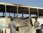 Bus-Iraq-29May Passenger bus ripped by roadside bomb planted by terrorits from Iran