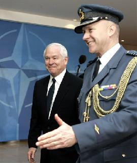 Gates-Brussels Gates: Iran Sees U.S. As Bogged Down