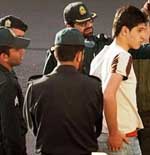 A young man arrested by the mullahs' police A young man arrested by the mullahs' police